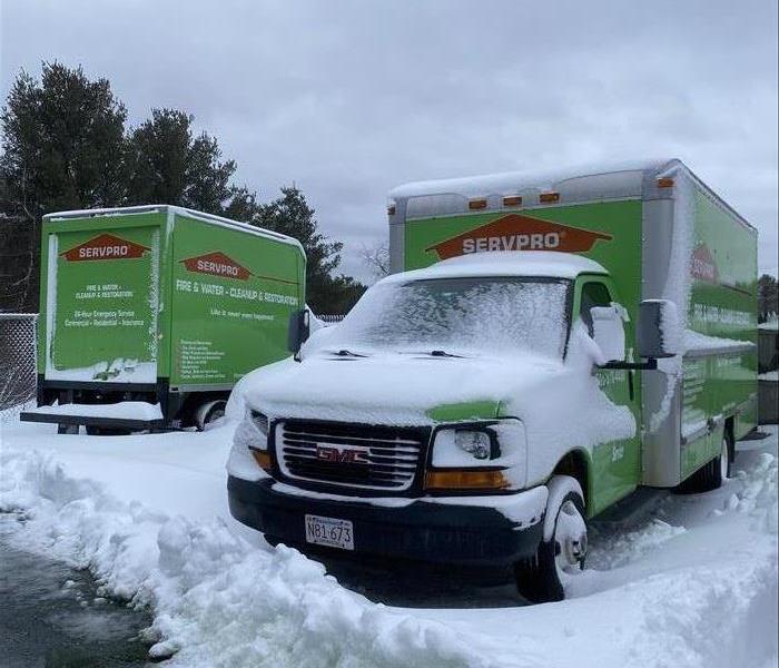 green truck with snow